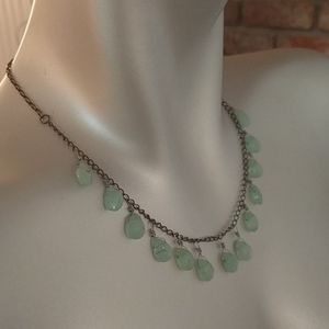 Necklace with light green multi faceted 'stones'